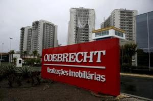 An Odebrecht placard is pictured in front of a construction site in Rio de Janeiro, Brazil, June 19, 2015. . REUTERS/Pilar Olivares