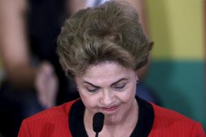 Brazil's President Dilma Rousseff reacts during a conference with representatives from workers' unions and social movements, in Brasilia August 13, 2015. REUTERS/Ueslei Marcelino