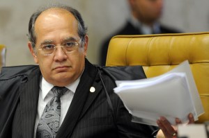 Brazilian Supreme Court Minister Gilmar Mendes during the session on the case of Italian Cesare Battisti in Brasilia, on June 8, 2011.Thirty years after fleeing Italy, former far-left militant Cesare Battisti will likely find out Wednesday whether he will be extradited to his native country on murder charges or remain in Brazil, perhaps as a free man. Italy wants Brazil to extradite Battisti, convicted in an Italian court in 1993 for the murders of four people in the 1970s when he was a member of the radical Armed Proletarians for Communism (PAC) group. AFP PHOTO/Evaristo SA (Photo credit should read EVARISTO SA/AFP/Getty Images)