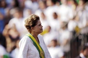 Brazil's President Dilma Rousseff stands in a vehicle during a civic-military parade to commemorate Brazil's Independence Day in Brasilia, Brazil, September 7, 2015. REUTERS/Ueslei Marcelino